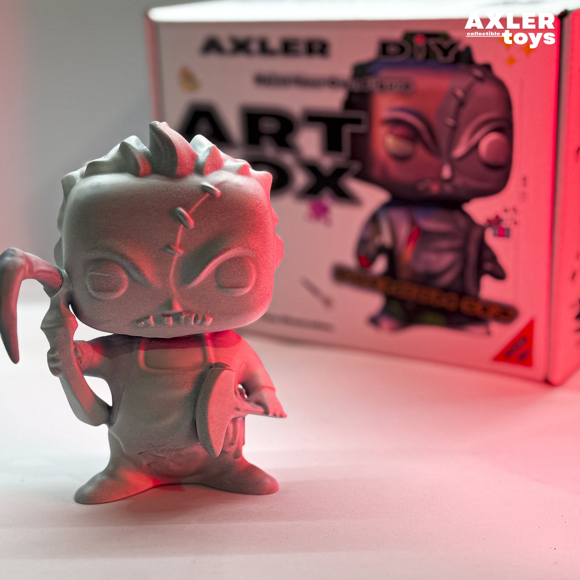 Toy figure pudge dota 2 with a red glow in front of an Axler Toys box